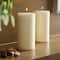12 Packs: 2 ct. (24 total) Ivory Pillar Candle Pair by Ashland&#xAE;
